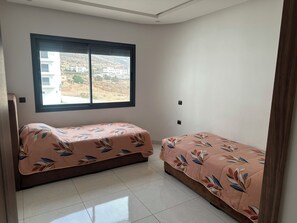2 chambres, accès au Wi-Fi (inclus), literie fournie