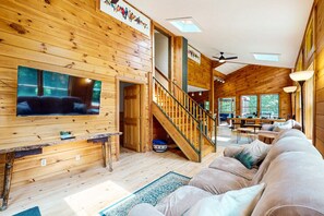 Smart TV, fireplace, table football, books