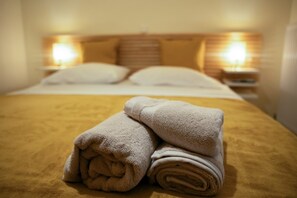 1 habitación, tabla de planchar con plancha, wifi y ropa de cama 