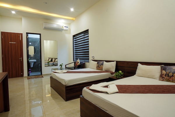 Family Quadruple Room, City View | Iron/ironing board (on request), WiFi (free)