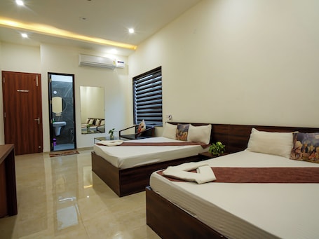 Family Quadruple Room, City View | 1 bedroom, iron/ironing board, free WiFi