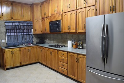Spacious 4-bedroom house in charming Bon Accord with WiFi. 3 mins from beaches