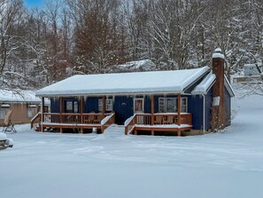Stroll out to the deck and enjoy the serene surroundings from this cozy retreat.