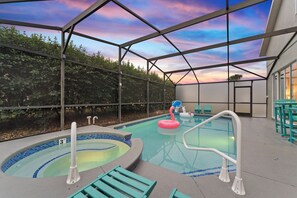 Outdoor pool, a heated pool - Disney-Area 5BR Home 2 Master Suites • Private Pool, Spa, Game Room & Movie Room (Clermont)