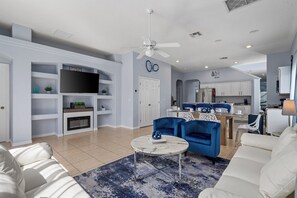 Smart TV, chimenea, estéreo, impresora