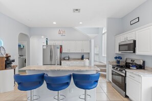 Fridge, microwave, oven, stovetop - Disney-Area 5BR Home 2 Master Suites • Private Pool, Spa, Game Room & Movie Room (Clermont)