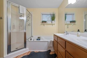 Shower, hair dryer, towels, shampoo