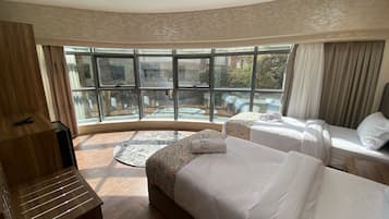 Panoramic Suite, 2 Bedrooms, City View, Garden Area | 2 bedrooms, Egyptian cotton sheets, premium bedding, down comforters