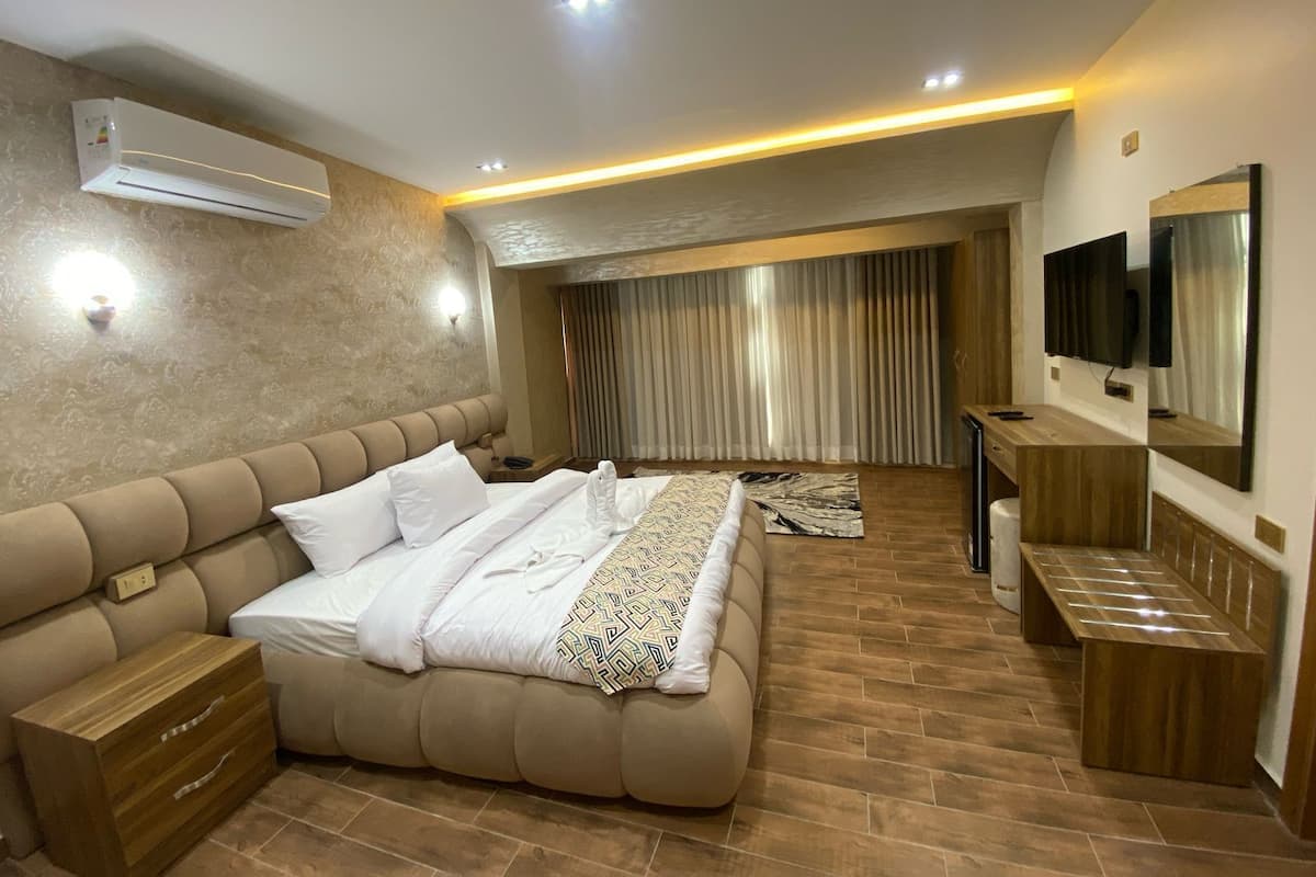 Panoramic Suite, 2 Bedrooms, City View, Garden Area | 2 bedrooms, Egyptian cotton sheets, premium bedding, down comforters