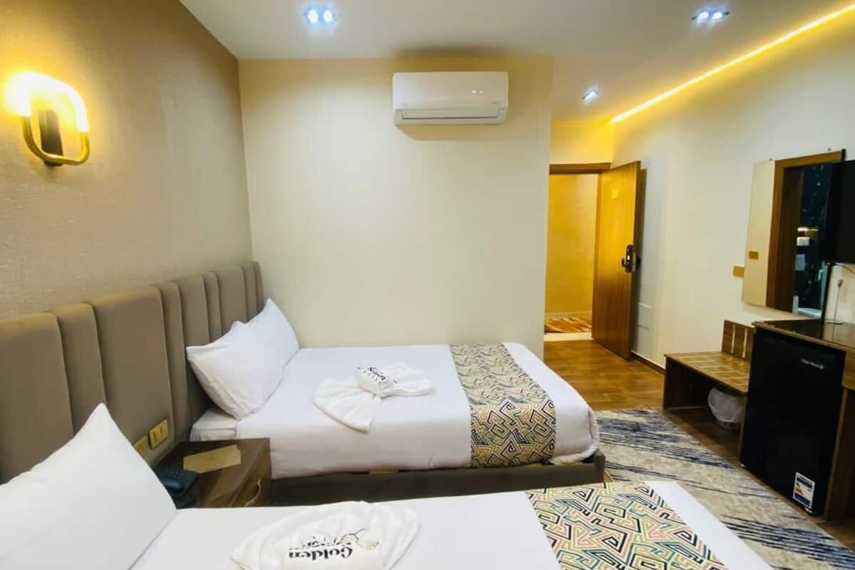 Chambre Deluxe, vue ville, côté jardin | 2 chambres, draps en coton égyptien, literie de qualité supérieure