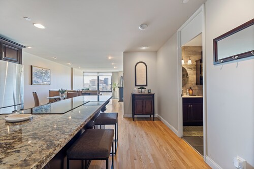 Luxury condo in Midtown Crossing on 8th floor with breathtaking city park views