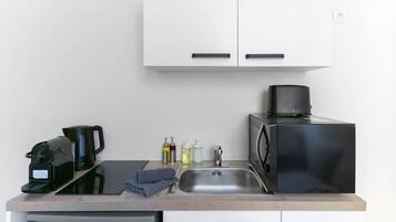 Fridge, microwave, coffee/tea maker, toaster