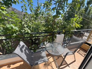Comfort Quadruple Room, Mountain View | Balcony - Azogire Hotel (Kantanos-Selino)