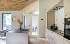 Fridge, dishwasher, coffee/tea maker