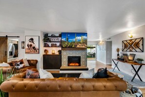 Smart TV, fireplace, books, music library