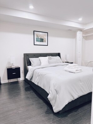 1 bedroom, desk, iron/ironing board, travel crib