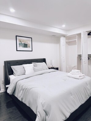 1 bedroom, desk, iron/ironing board, travel crib