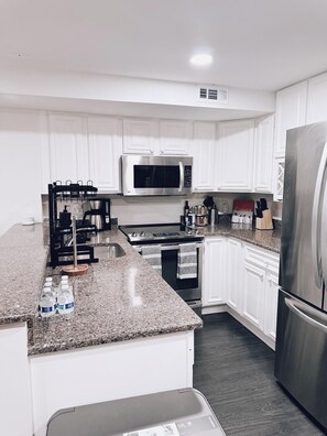 Fridge, microwave, oven, stovetop - Chic Retreat Near Capitol Hill with Office Space & SoulCycle Bike







 (Washington)