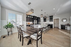 Dining - Luxury 5-bedroom house with 3 zone AC, TV’s everywhere, built to entertain. (West Jordan)