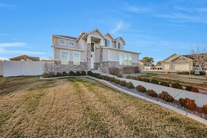 Exterior - Luxury 5-bedroom house with 3 zone AC, TV’s everywhere, built to entertain. (West Jordan)