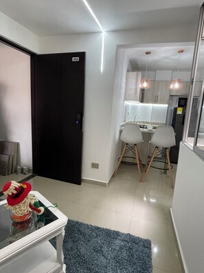 Appartamento Luxury | Area soggiorno | TV a schermo piatto, Netflix, servizi in streaming