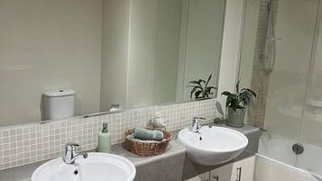 Hair dryer, towels, soap, toilet paper