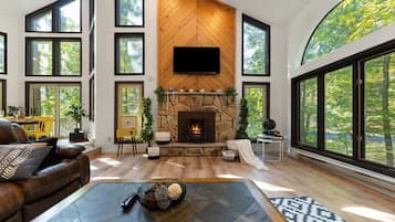 TV connectée, cheminée, table de tennis de table, espaces bureaux