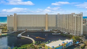 A large hotel with multiple floors and a central courtyard.