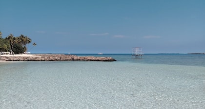 Close to the island's best spots, with
cozy rooms and peaceful outdoor spaces.
