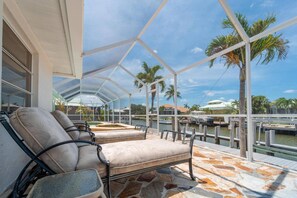 Terrace/patio - Sunny Waterfront Home Fully Equipped for Beach Excursions; Family Friendly in Great Location! (Marco Island)