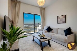 Luxury-Apartment, Stadtblick | Wohnbereich