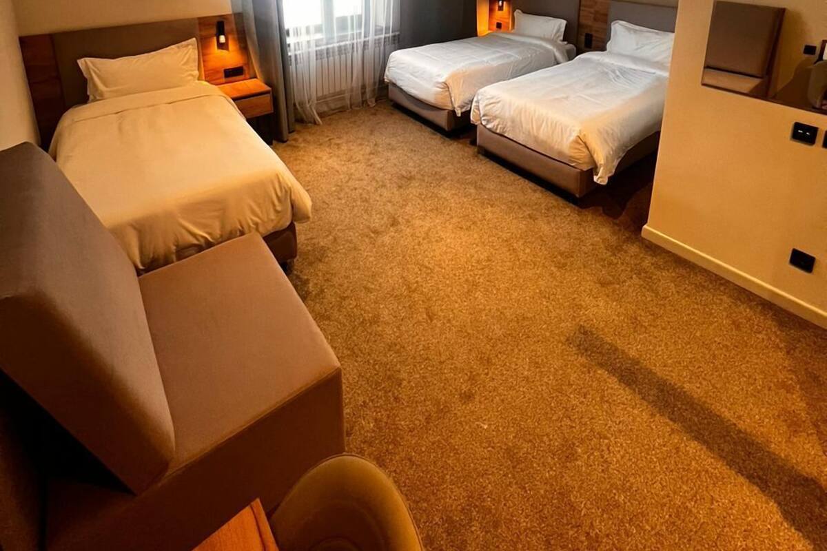 Standard Triple Room | Desk, laptop workspace, blackout drapes, soundproofing