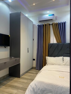 2 quartos, ferros/tábuas de passar roupa, Wi-Fi, roupa de cama