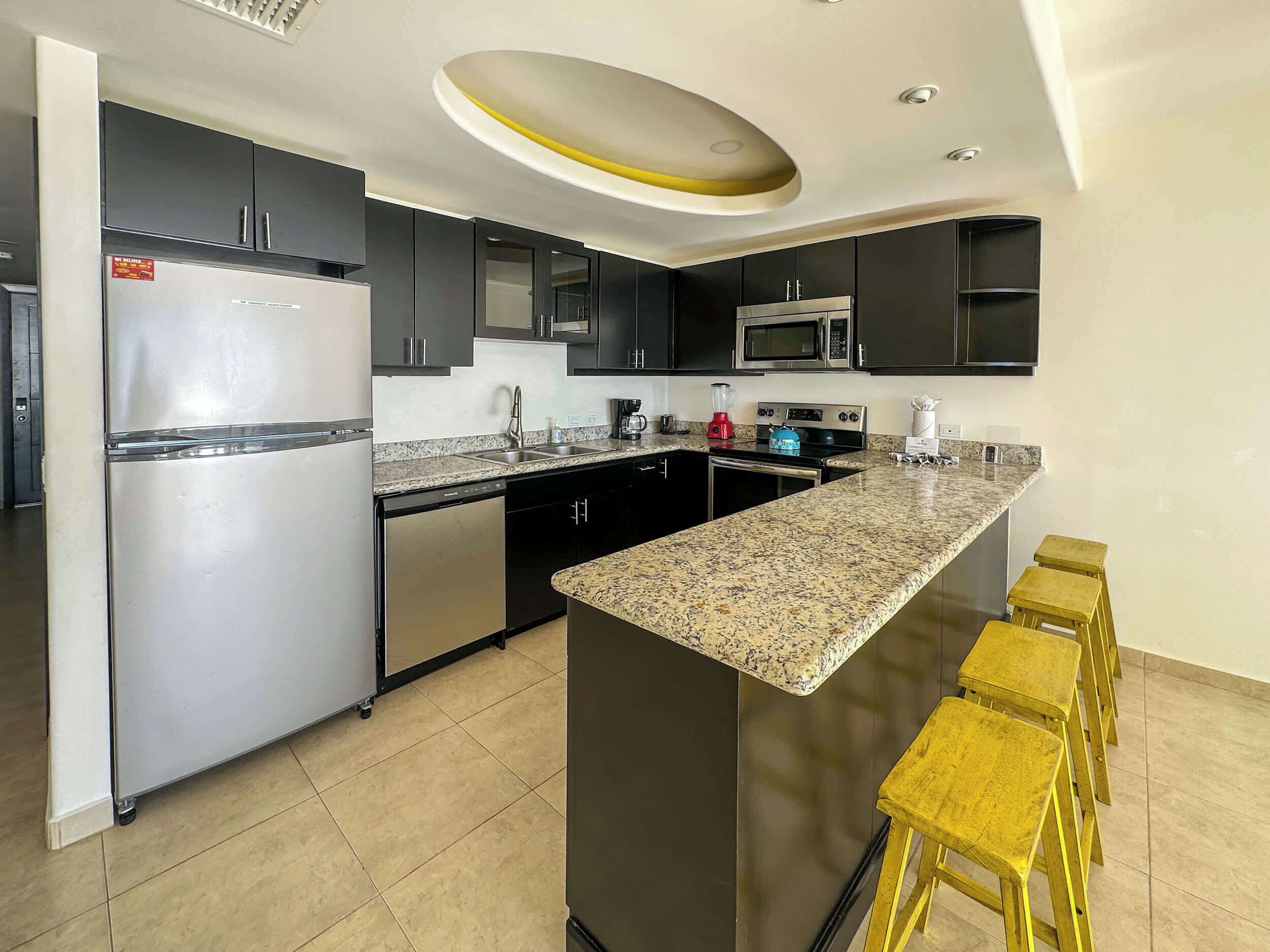 Coffee/tea maker, fridge, microwave, oven