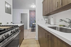 Fridge, microwave, oven, stovetop - Coastal 1 Bedroom Steps from Ocean (Miami Beach)