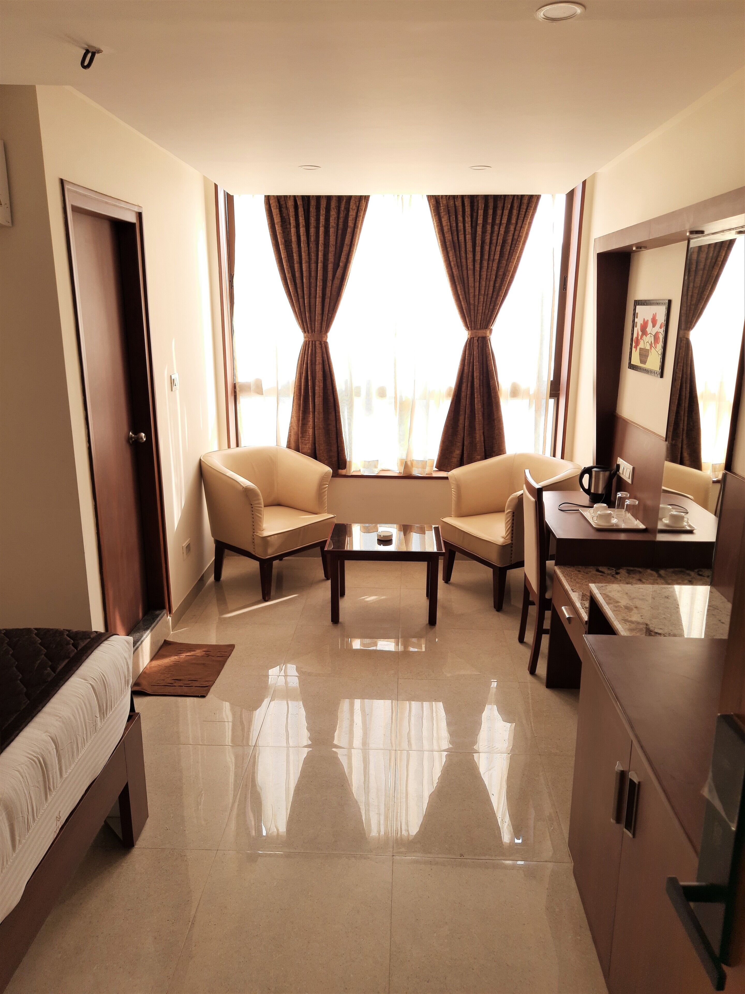 Luxury Room | Desk, laptop workspace, blackout drapes, iron/ironing board