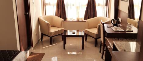 Luxury Room | Desk, laptop workspace, blackout drapes, iron/ironing board