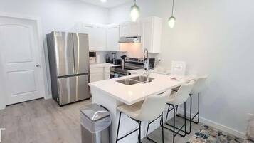Condo, 3 Bedrooms | Private kitchen | Fridge, oven, coffee/tea maker, toaster