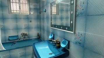 Hair dryer, bidet, towels, soap