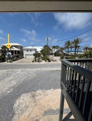 Enjoy stunning ocean views from this beachfront property, featuring a driveway and serene surroundings.