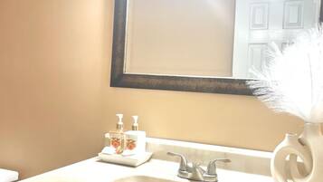 Hair dryer, towels, soap, toilet paper