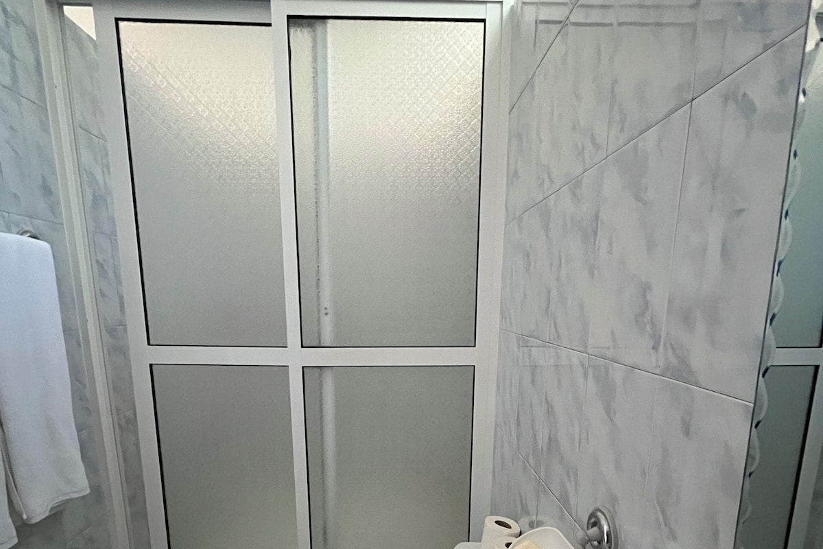 Shower, towels, soap, shampoo
