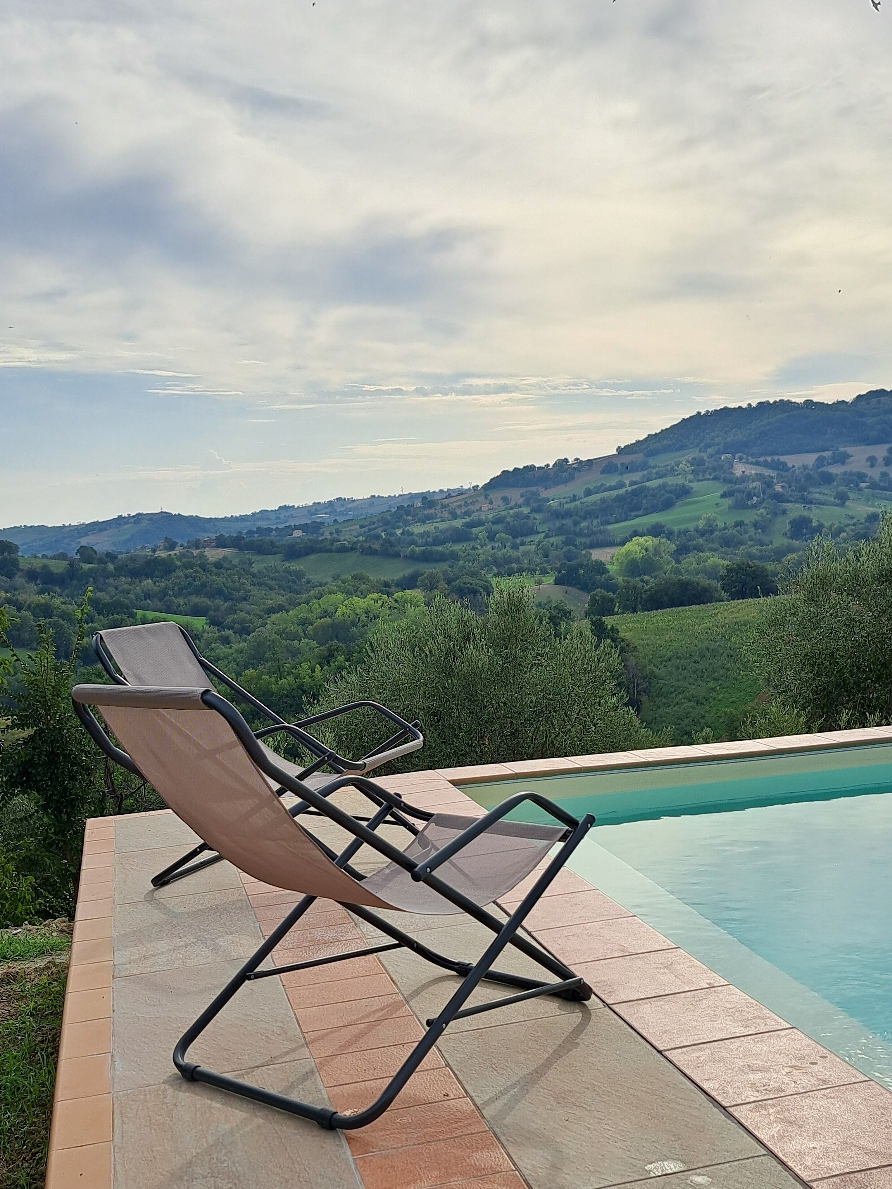Piscine extérieure (ouverte en saison), parasols de plage