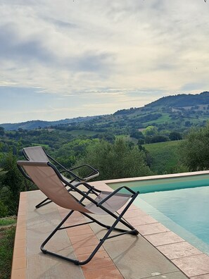 Seasonal outdoor pool, pool umbrellas, sun loungers