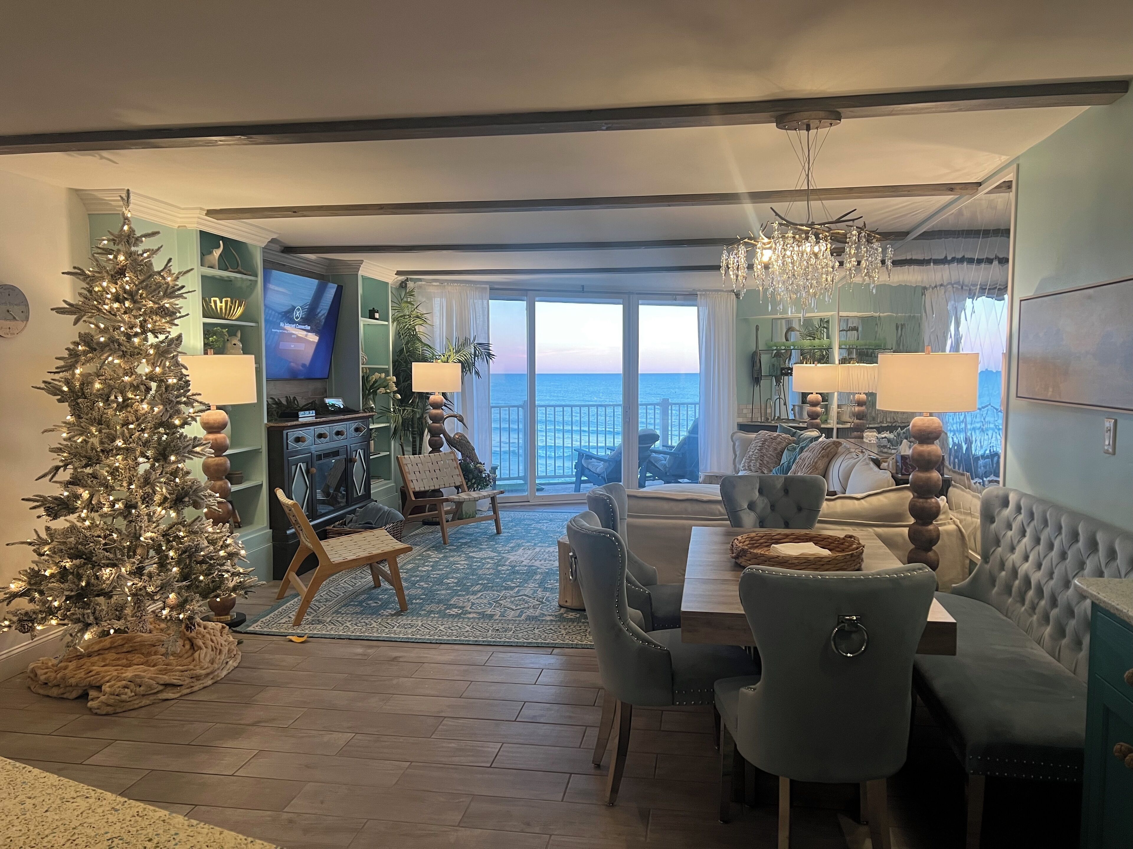 Smart TV, fireplace, books, computer monitors