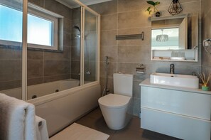 Hair dryer, towels, soap, shampoo