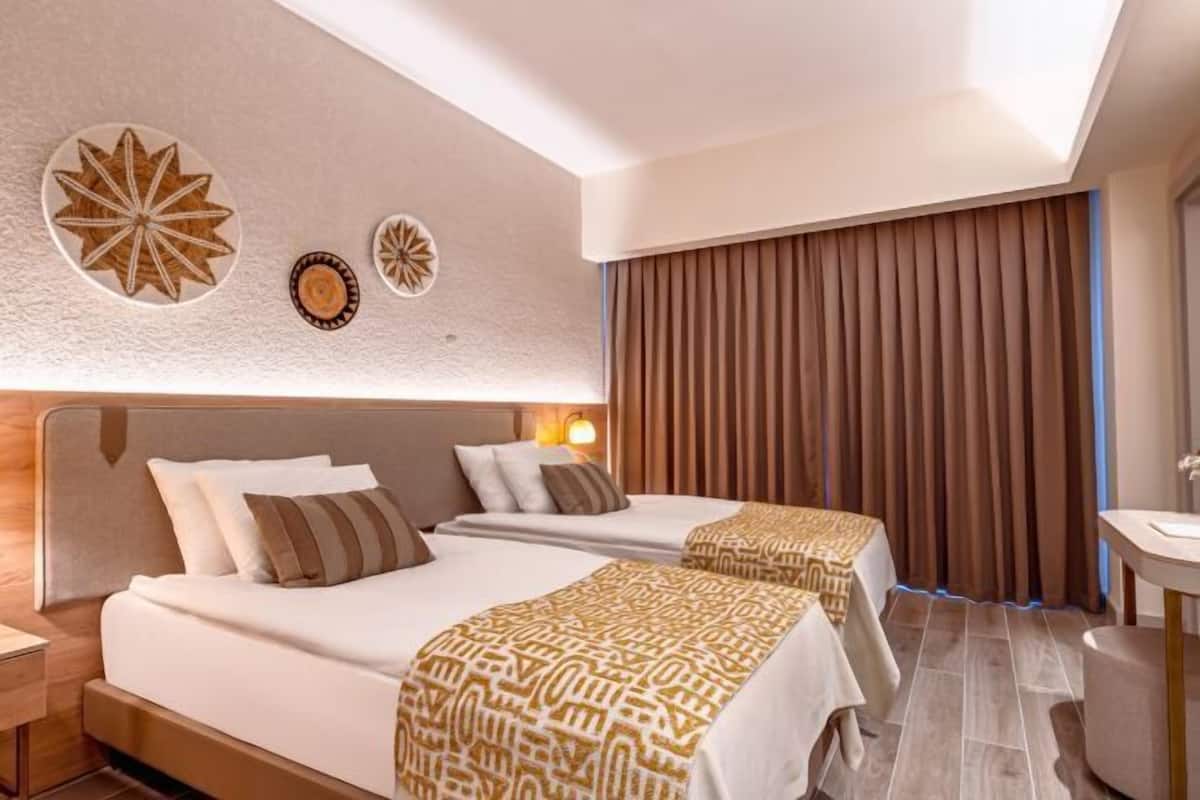 Hypo-allergenic bedding, down duvets, pillow-top beds, free minibar