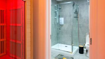 Shower, hair dryer, towels, soap