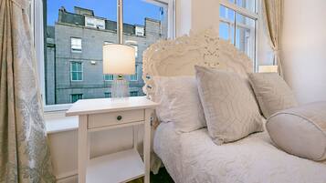 3 bedrooms, desk, iron/ironing board, travel cot