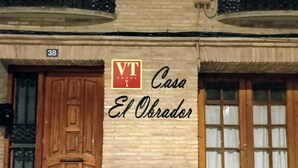 A building with a sign reading "Casa El Obrador" and a number "38" above a door. - HOME TO ENJOY IN STYLE !!!! Garden, barbecue, swimming pool, swings, ping-pong. (Arguedas)